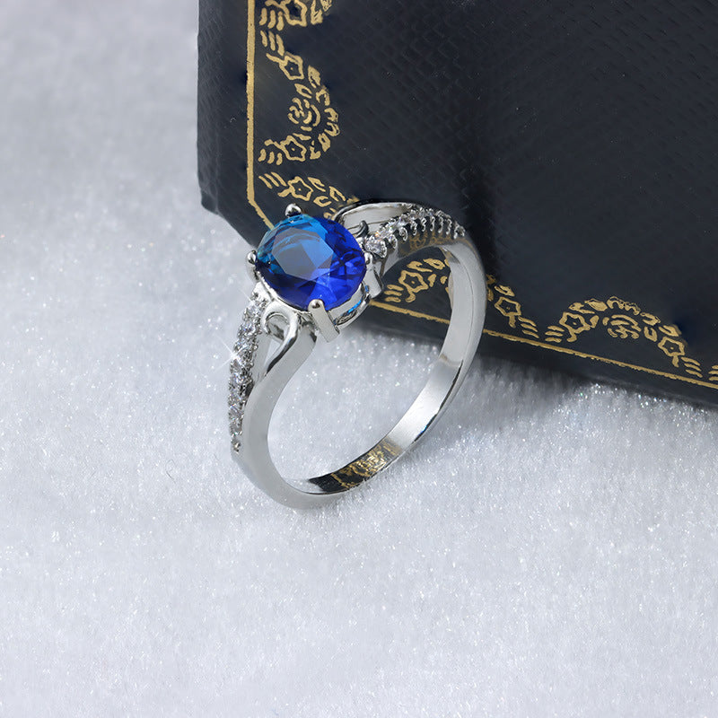 Ring Blauer Stein · elegant gefasst