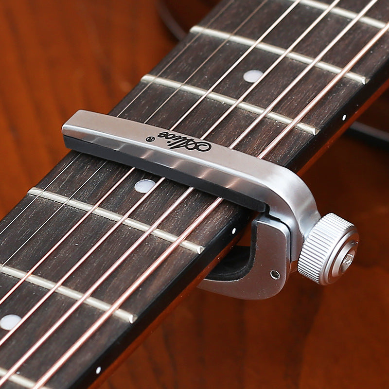 Kapodaster für Folk- und E-Gitarren – Bild 6 | LuxeStyle