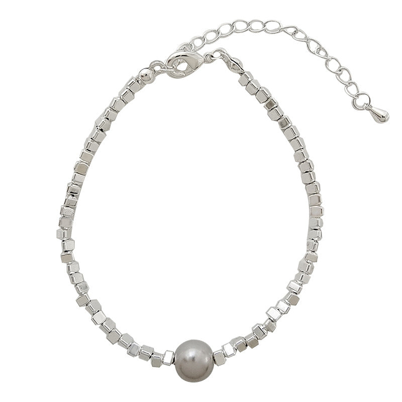 Asymmetrisches Kettenarmband mit Perlen – Bild 5 | LuxeStyle