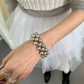 Mehrreihiges silbernes Perlenarmband – Bild 4 | LuxeStyle