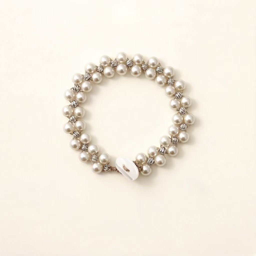 Armband mit grossen und kleinen Imitationsperlen