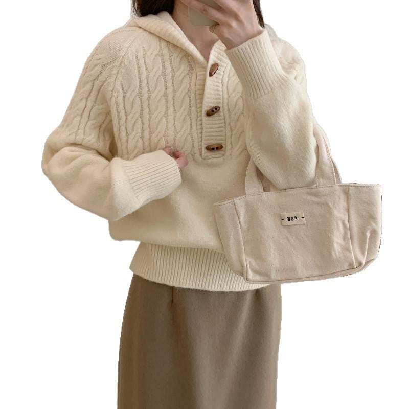 Kabelmuster-Pullover