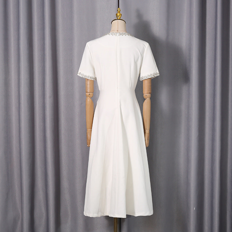 Langes Kleid mit Diamant-Schleife am Ausschnitt – Bild 4 | LuxeStyle