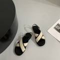 Geflochtene minimalistische Sandalen mit Kreuzriemen