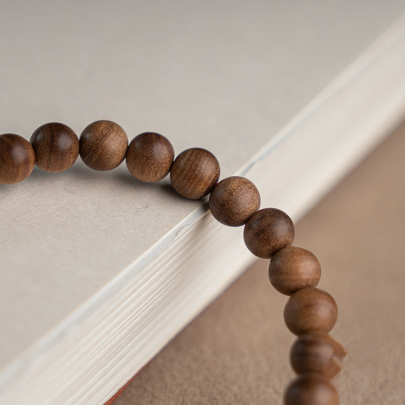 Tigerstreifen-Perlenarmband aus Lao Shan Tan – Bild 2 | LuxeStyle