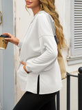 Oversized Hoodie mit Bauchtasche und Seitenschlitzen