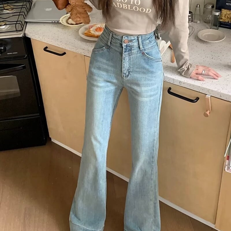 High-Waist Jeans mit weitem Bein und Fransen