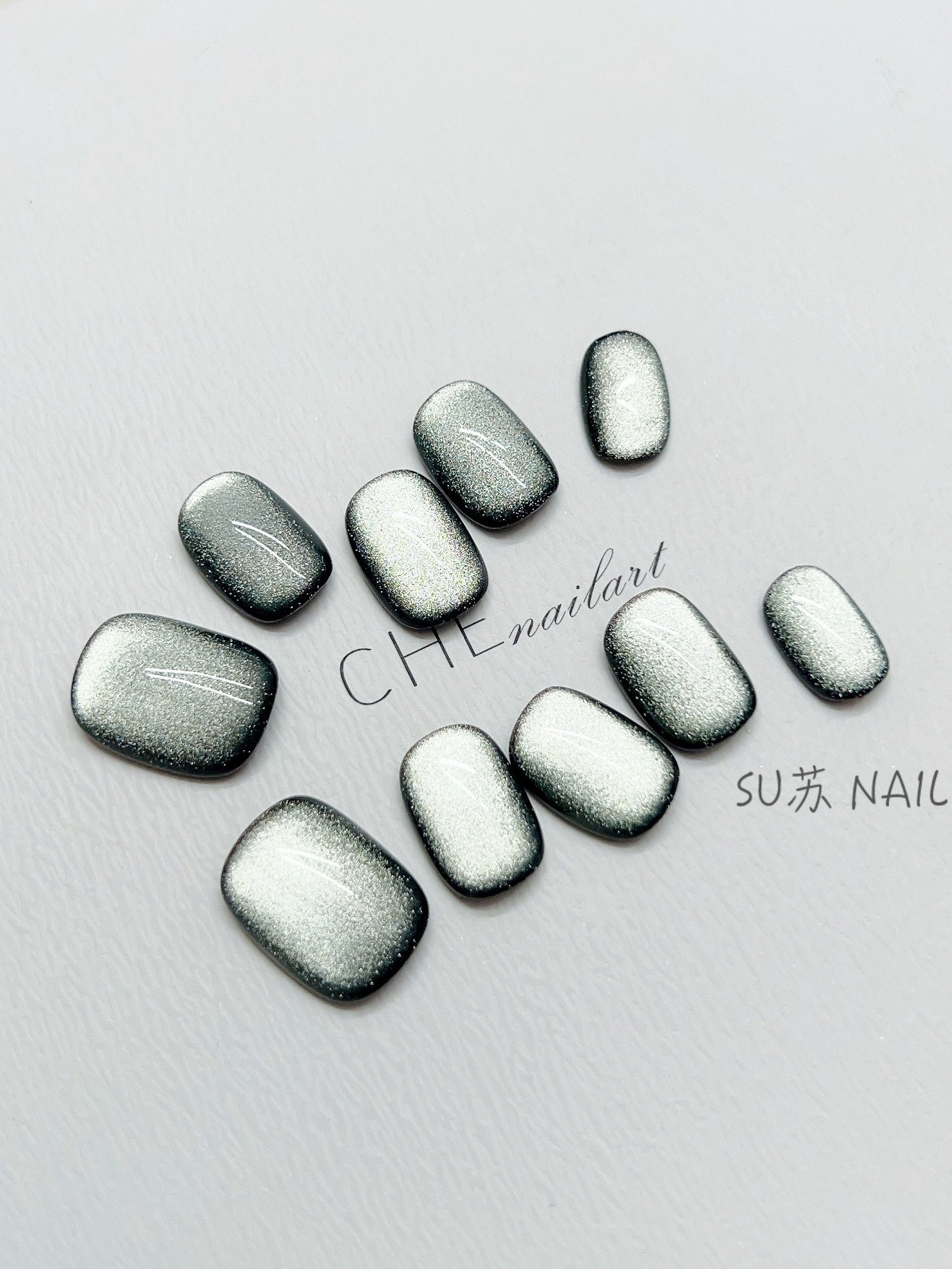 Dunkelgrüne Cat Eye Kunstnägel