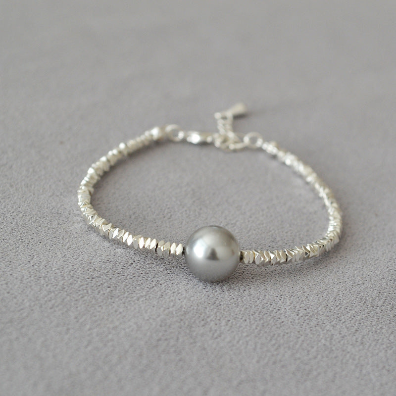 Minimalistisches Perlenarmband mit Silberelementen – Bild 2 | LuxeStyle