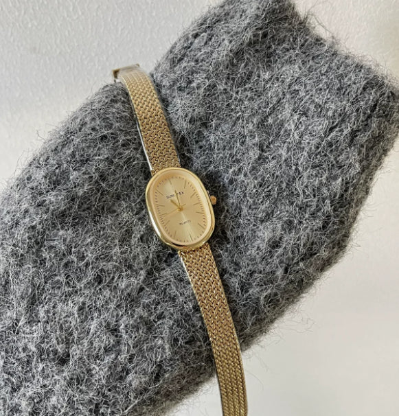 Elegante Kettenuhr