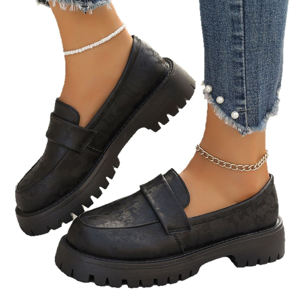 Britische Slip-on Loafer mit Chunky-Absatz
