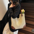 Geflochtene Stroh-Schultertasche mit Lederdetails