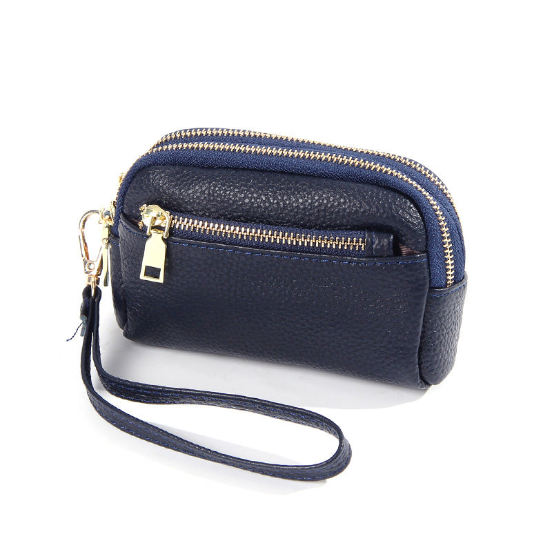 Minimalistische Leder-Münztasche mit drei Reissverschlüssen – Bild 5 | LuxeStyle