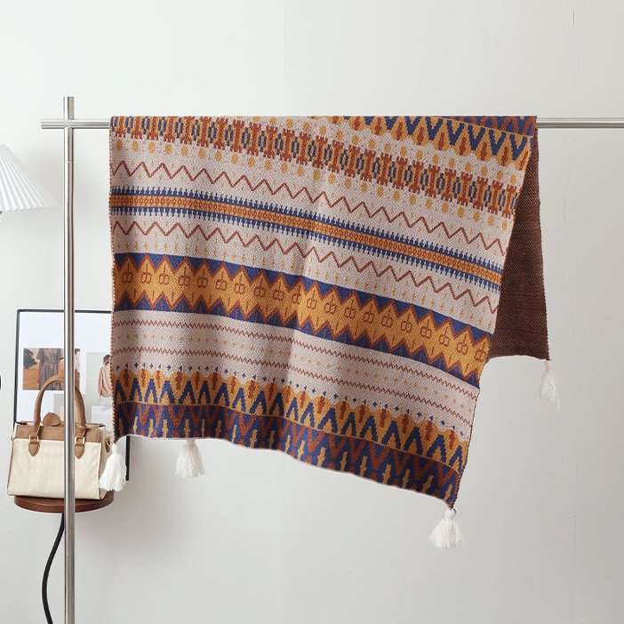 Ethno Strick-Poncho mit Quasten