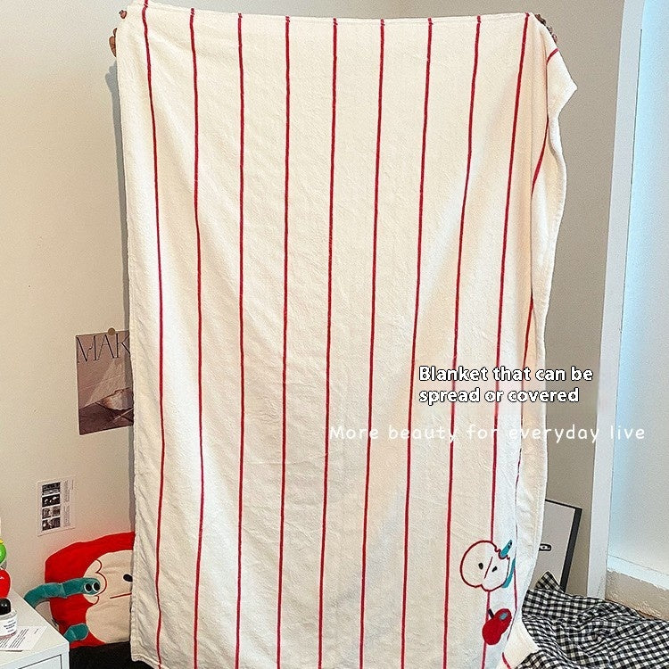 Plaids und Kissen in einem