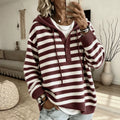 Gestreifter Kapuzenpullover aus Strick – Bild 1 | LuxeStyle