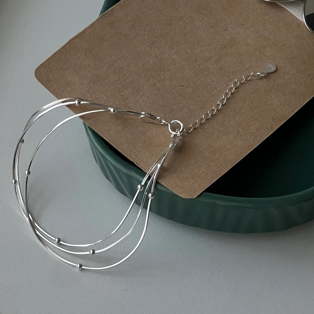 S925 Silber dreireihiges Schlangenketten-Armband – Bild 2 | LuxeStyle