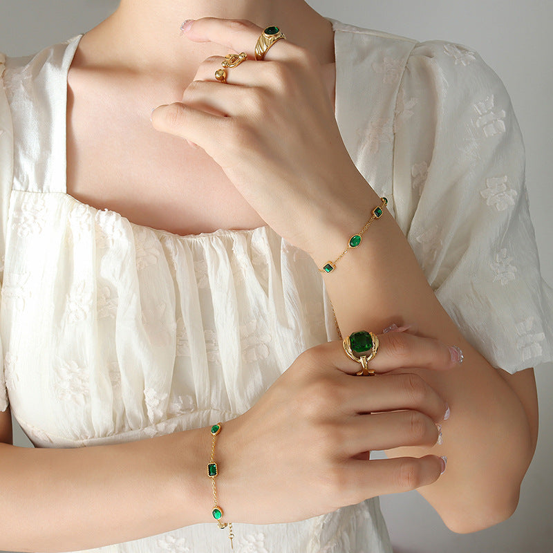 Vergoldetes Zirkon-Armband mit Smaragd-Inlay – Bild 6 | LuxeStyle