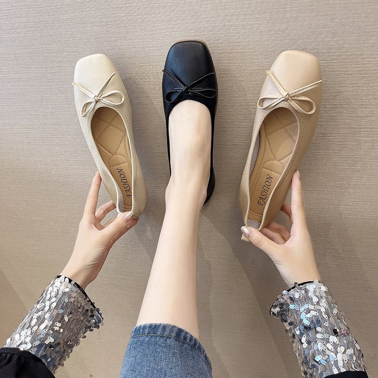 Elegante Pumps mit Schleife und flachem Absatz