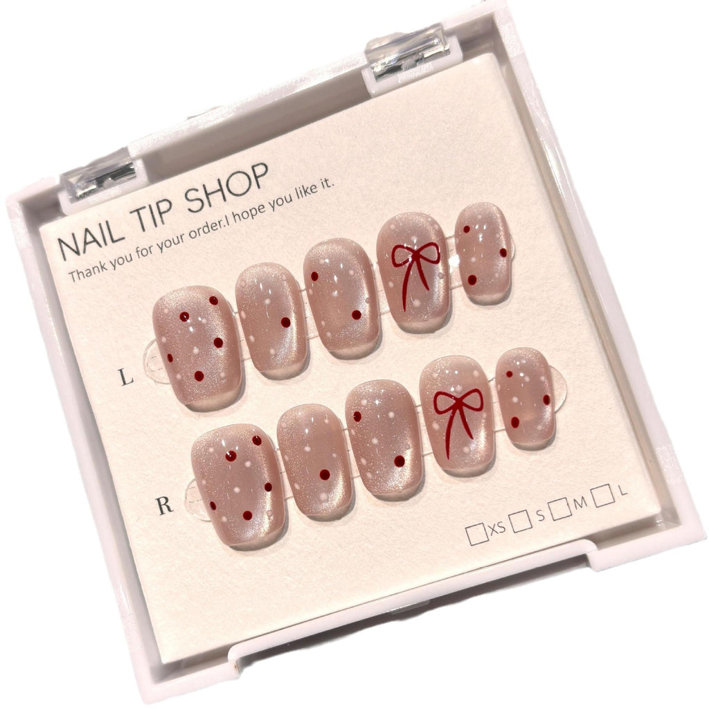 Cat-Eye Nagel-Tips mit Polka-Dot Sticker