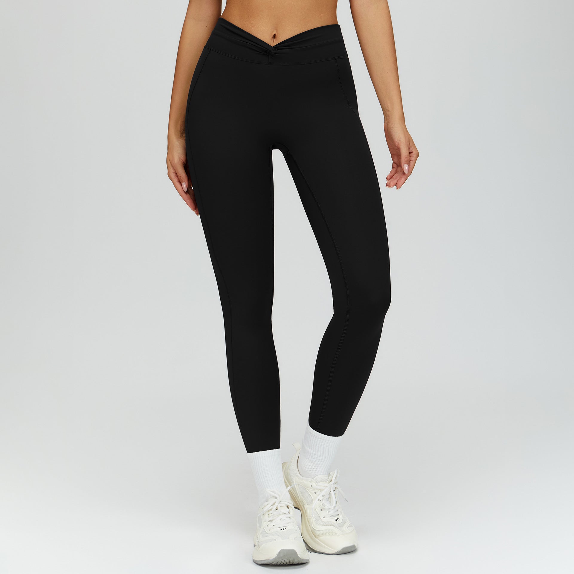 High-Waist Fitnesshose mit gedrehten Falten