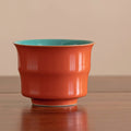Rote Keramik-Teetasse mit Farbglasur