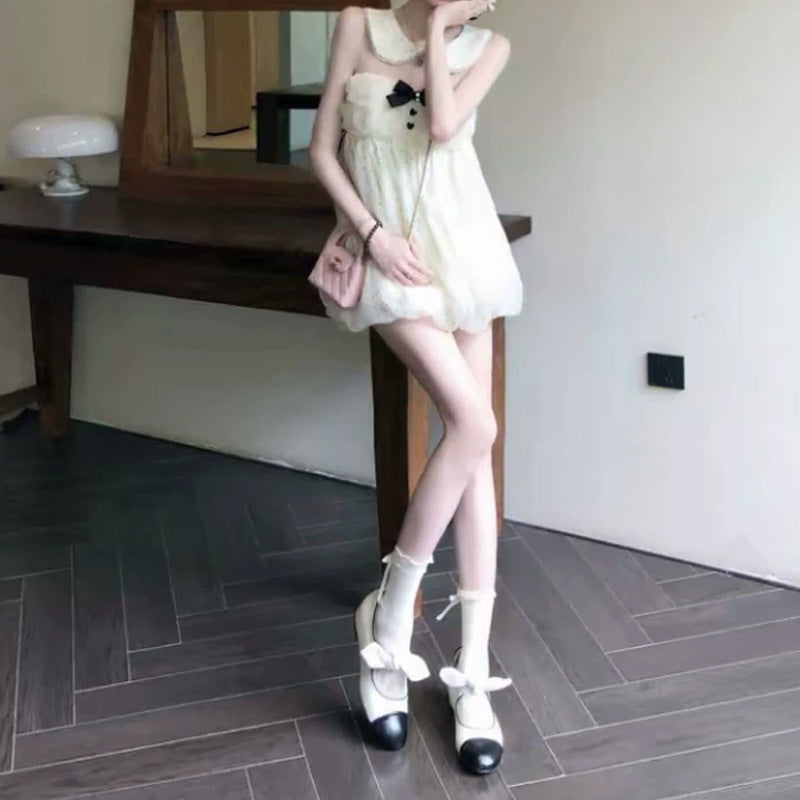 Tüllkleid mit Perlen und Schleifen – Bild 5 | LuxeStyle