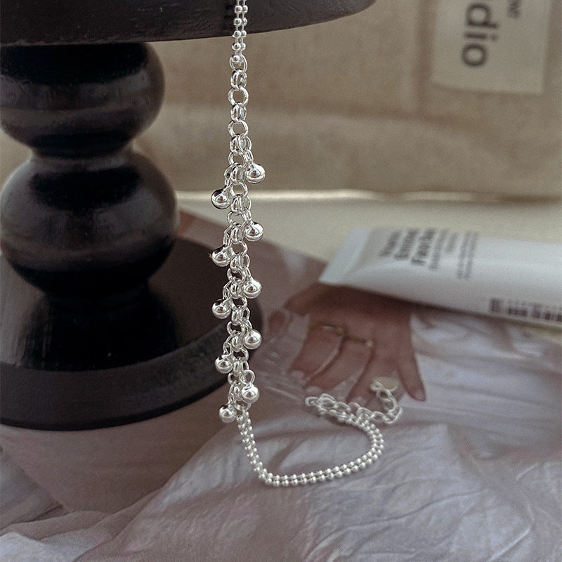 Silbernes Armband mit runden Perlen und Quaste – Bild 3 | LuxeStyle