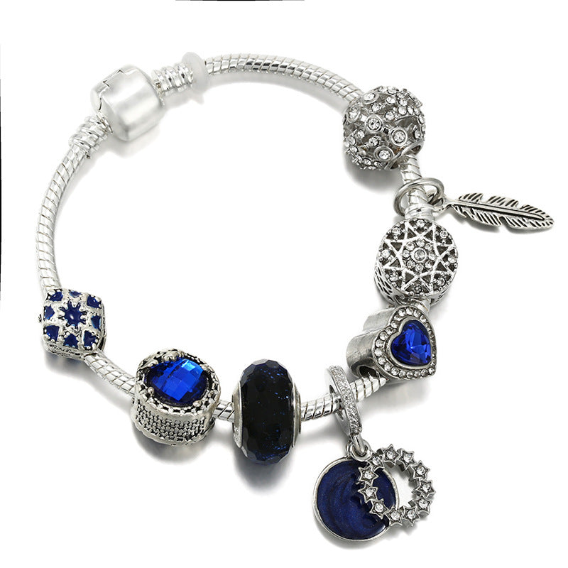 Armband mit Stern- und Mondanhänger – Bild 4 | LuxeStyle