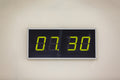 Digital LED clock on white background