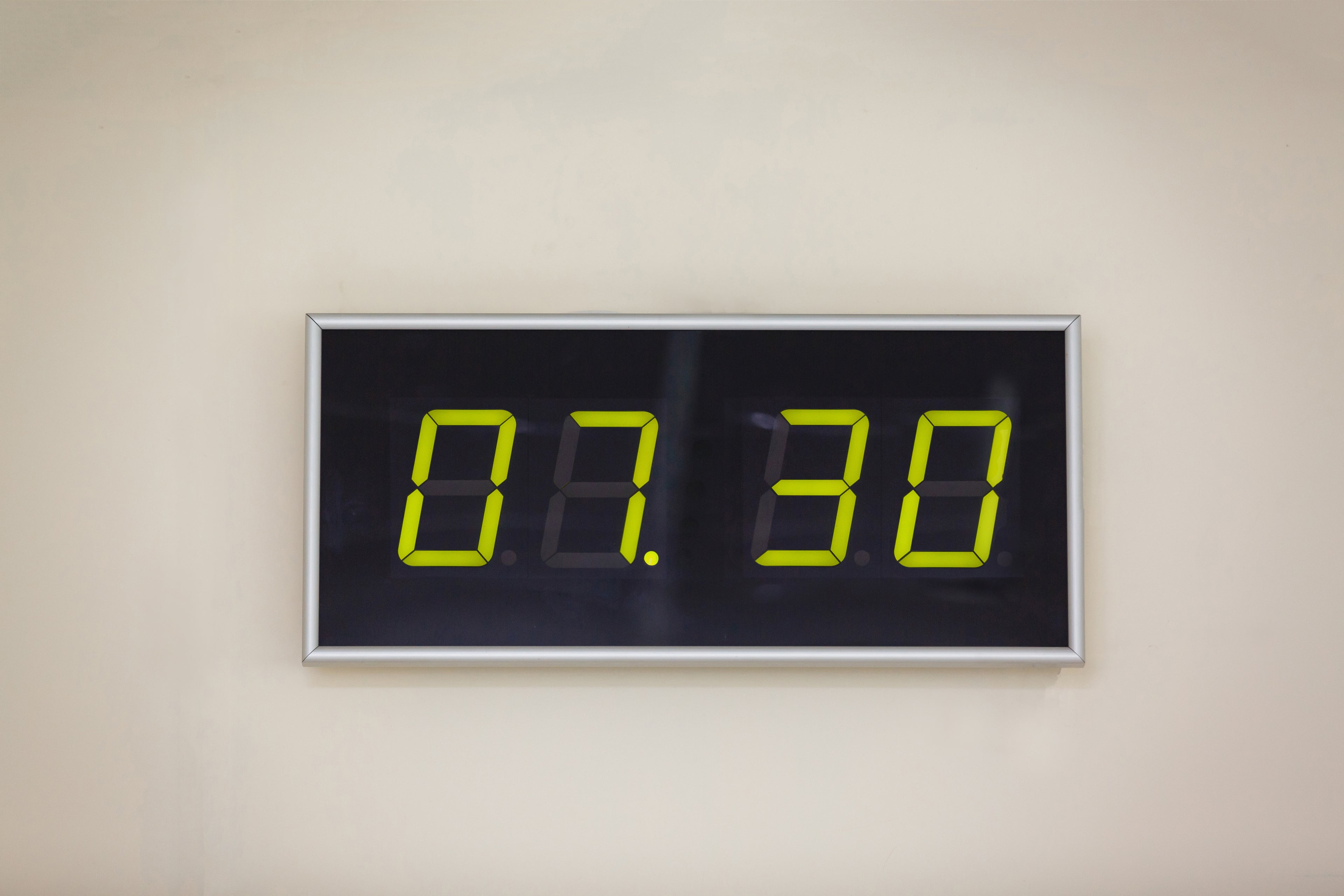 Digital LED clock on white background