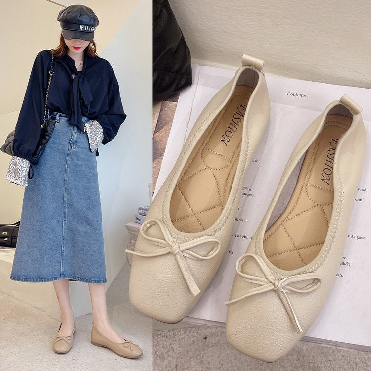 Elegante Pumps mit Schleife und flachem Absatz