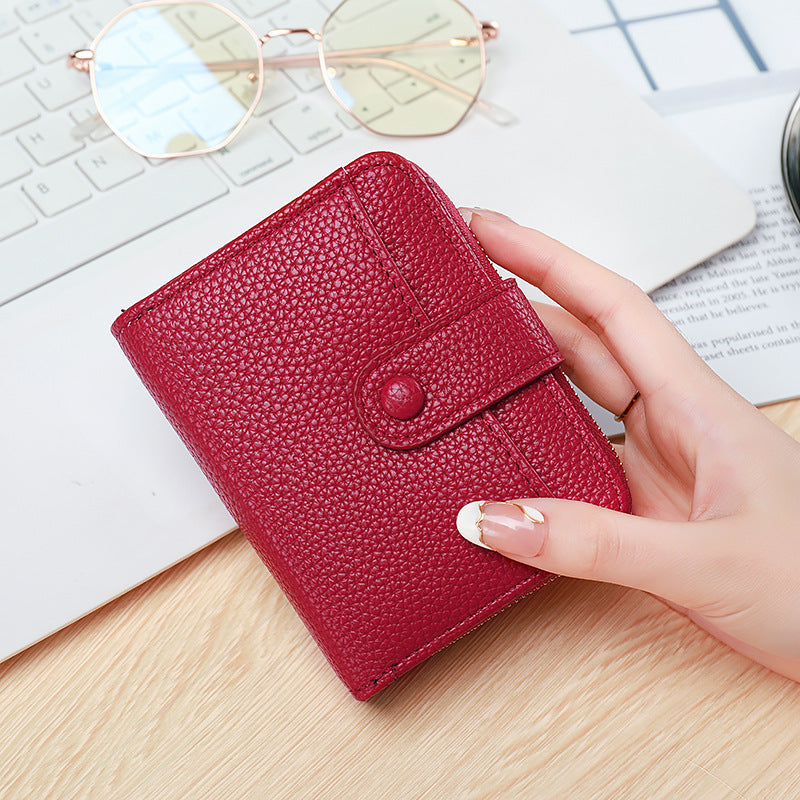 Kurzes Damen-Portemonnaie mit Litschi-Muster – Bild 2 | LuxeStyle