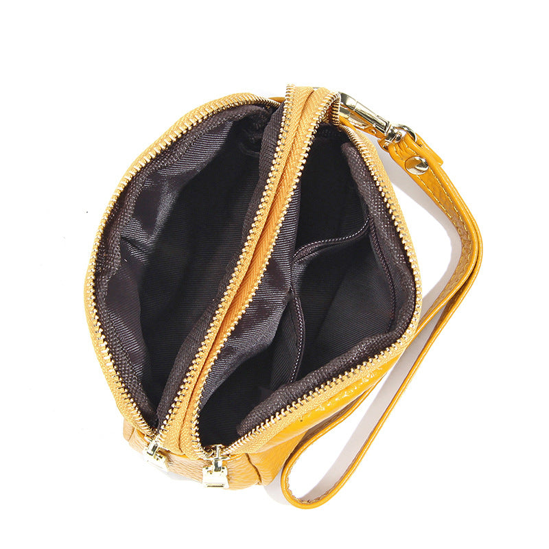 Minimalistische Leder-Münztasche mit drei Reissverschlüssen – Bild 3 | LuxeStyle