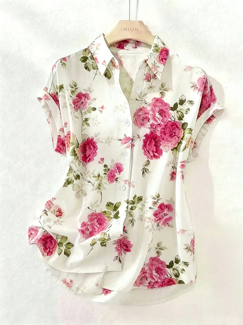 Bluse mit Blumenmuster und Reverskragen