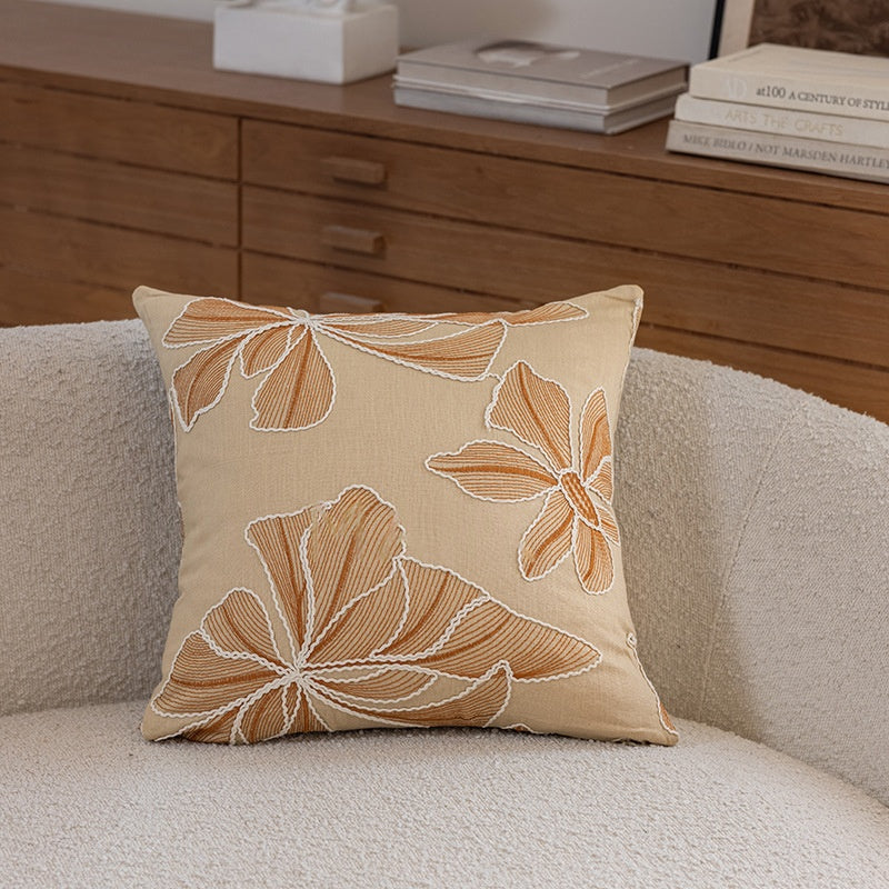 Kissenhülle mit floraler Stickerei