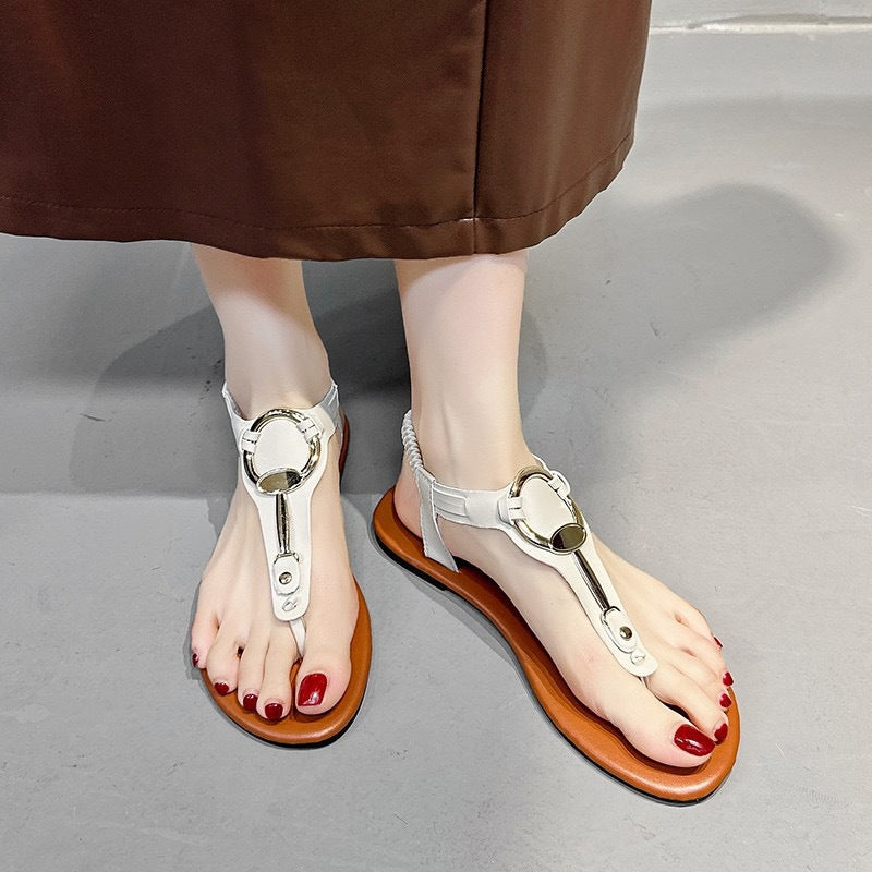 Zehensteg-Sandalen «Riva» · flach, mit Metall-Detail