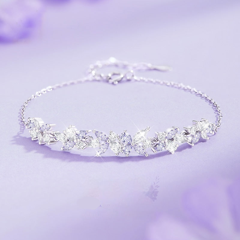 Armband mit Glyzinienblüte aus 999er Sterlingsilber – Bild 2 | LuxeStyle
