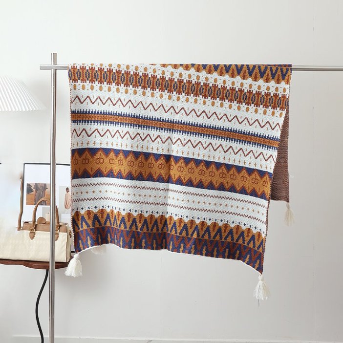 Ethno Strick-Poncho mit Quasten