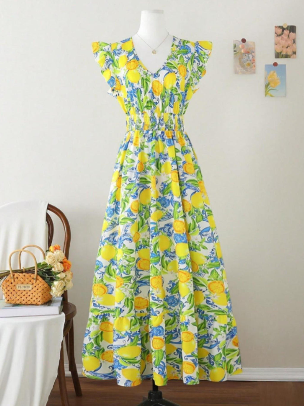 Türkises Kleid mit Zitronenmuster