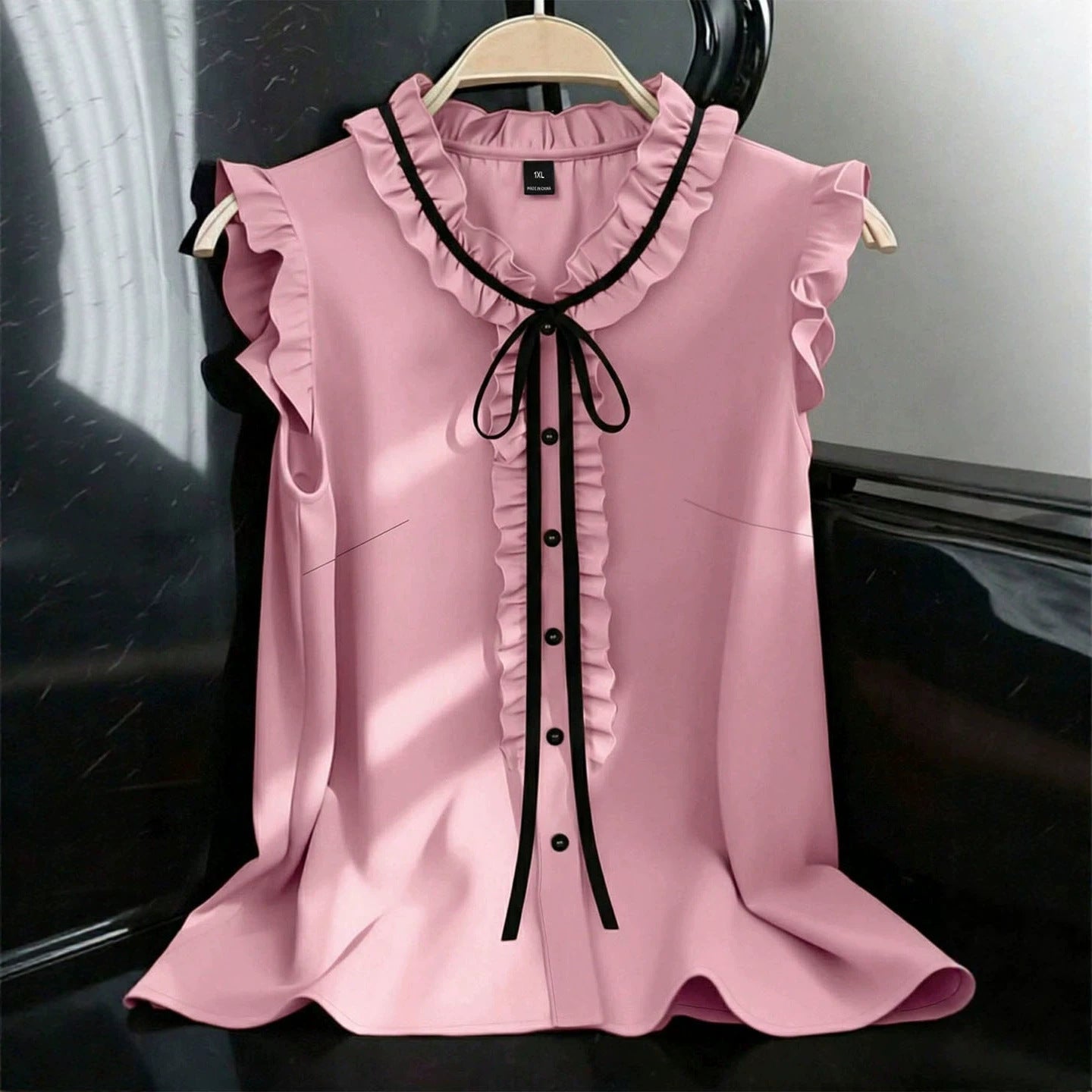 Ärmellose Bluse mit V-Ausschnitt und Schnürung