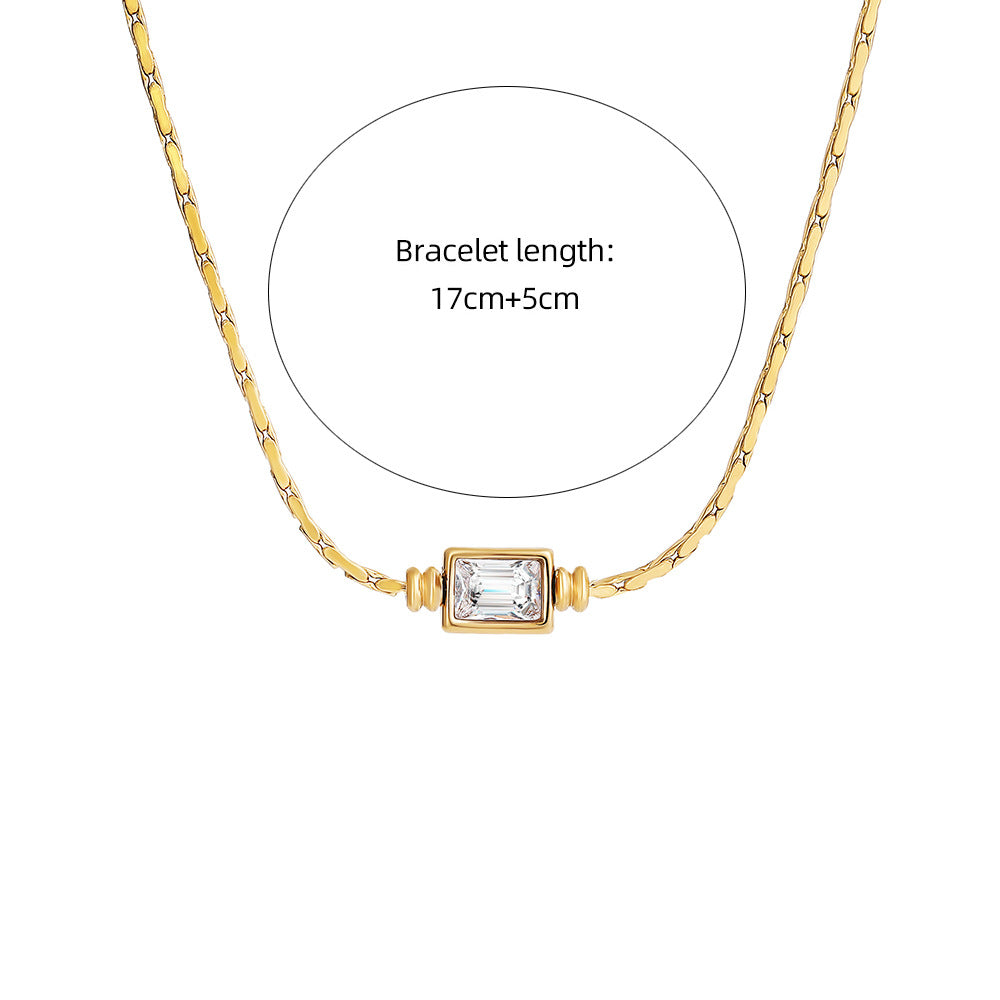 Titan-Stahl Armband mit Zirkonia-Knoten, Gold/Silber – Bild 2 | LuxeStyle