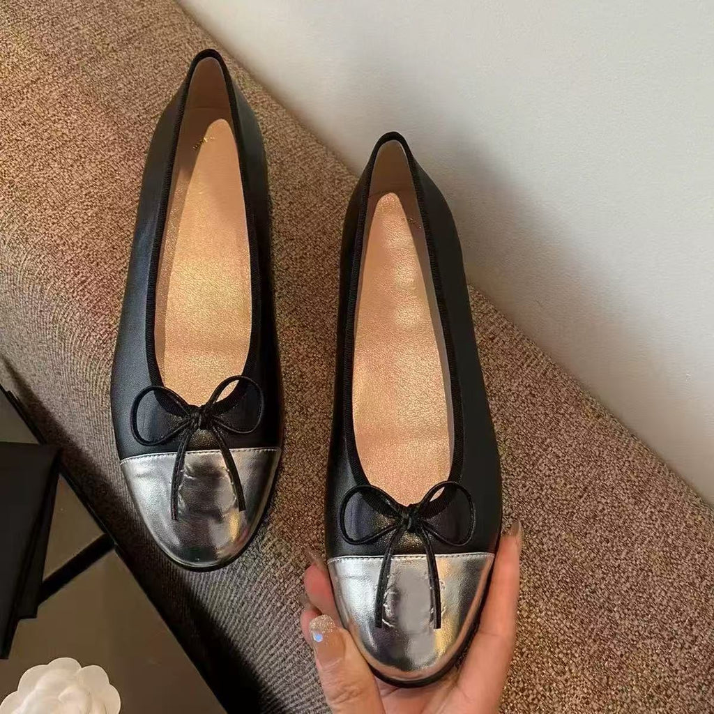 Flache Schuhe mit Schleife