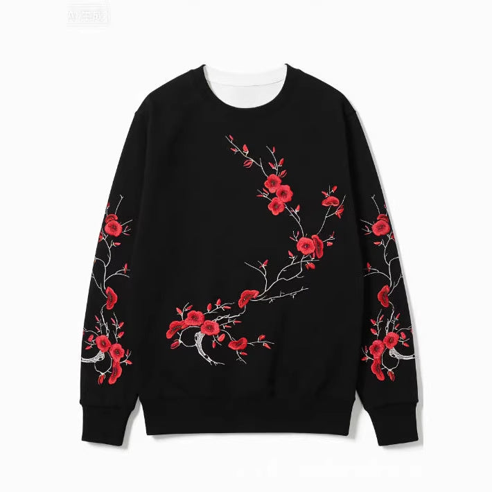 Schwarzes Sweatshirt mit rotem Pflaumenmuster