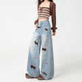 Weite Damenjeans mit Stickerei