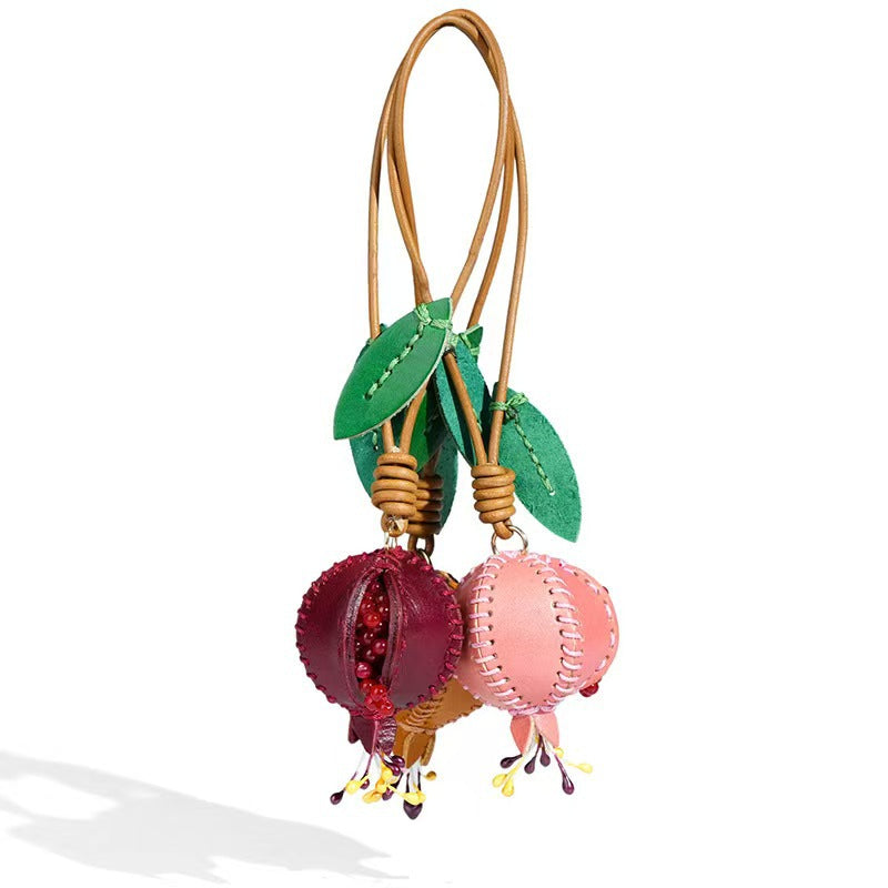Leder-Schlüsselanhänger mit Frucht-Motiv – Bild 6 | LuxeStyle