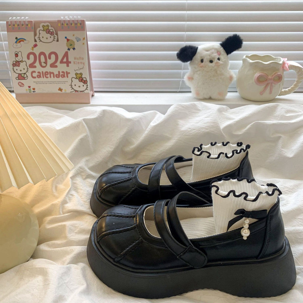 Japan-inspirierte Leder-Halbschuhe mit Absatz