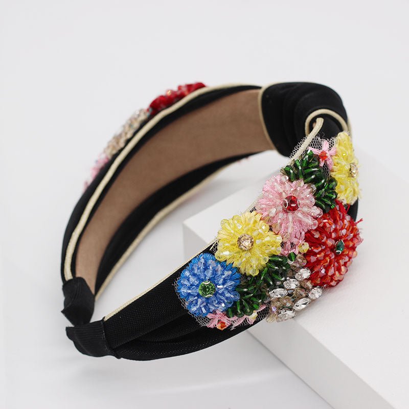 Haarband mit geometrischem Blumenmuster