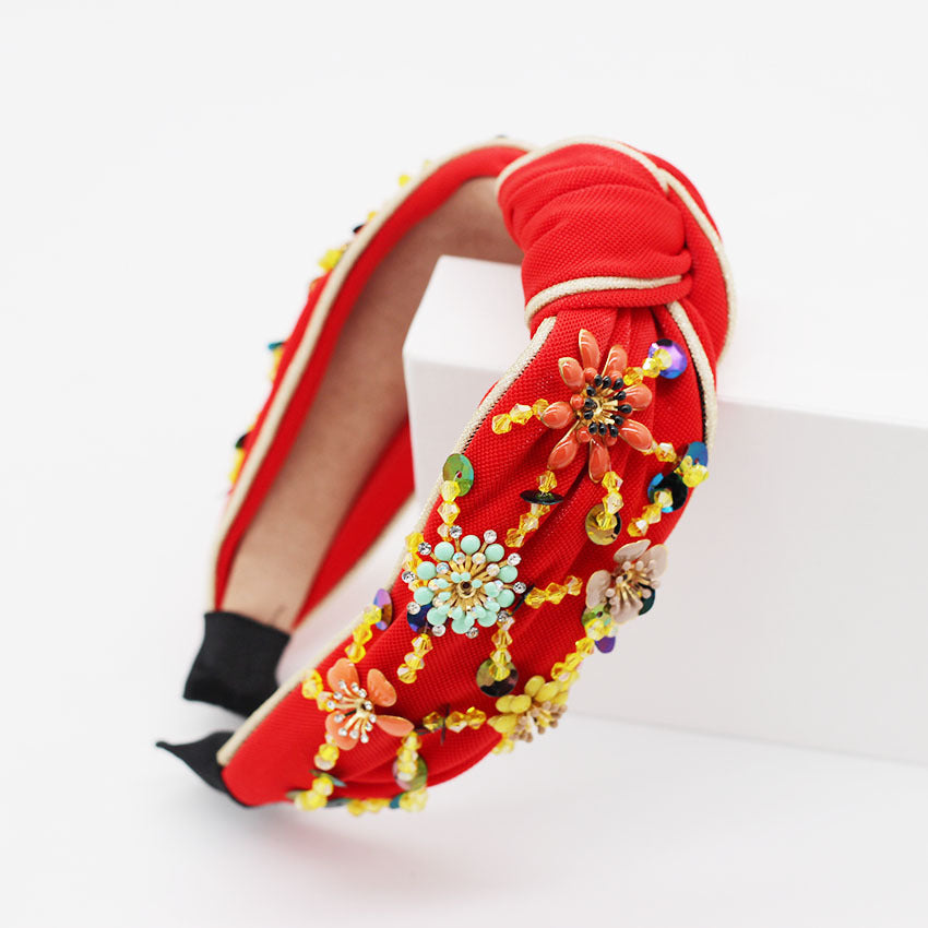 Haarband mit geometrischem Blumenmuster
