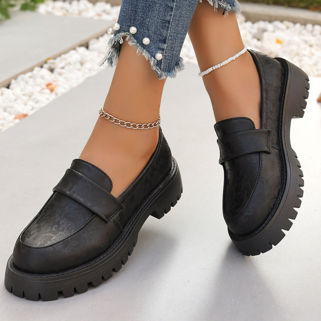 Britische Slip-on Loafer mit Chunky-Absatz